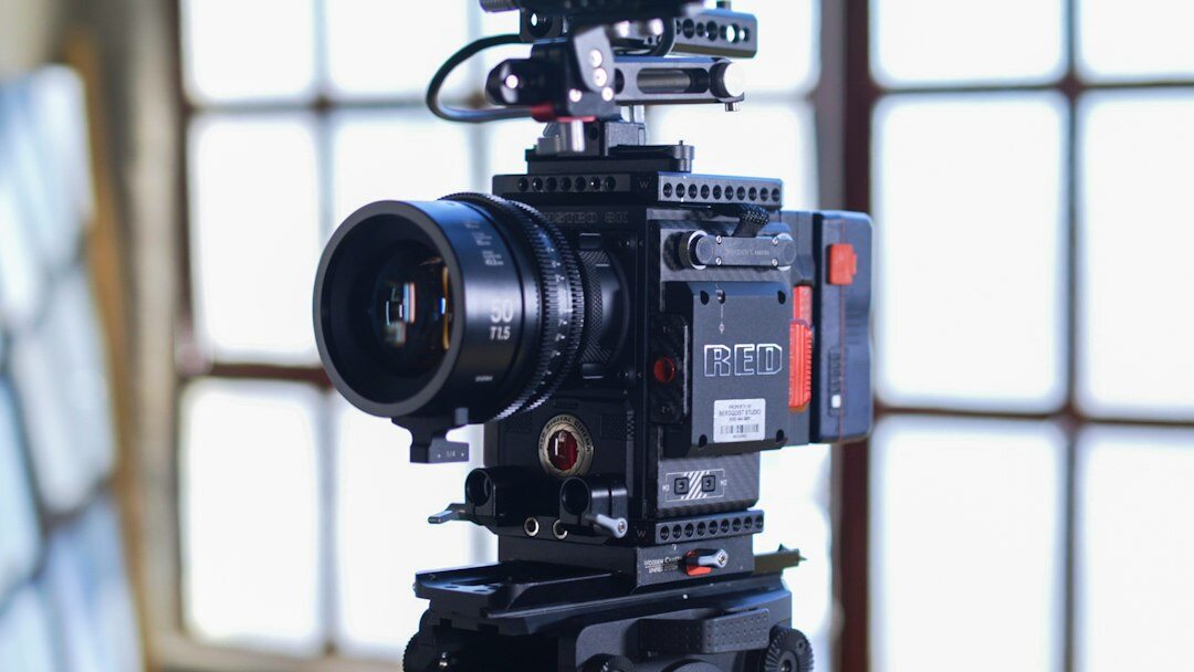 filmmaker with camera on set