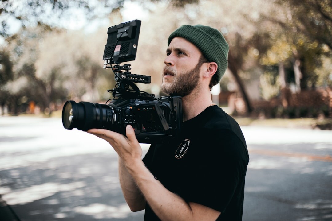 filmmaker with camera on set